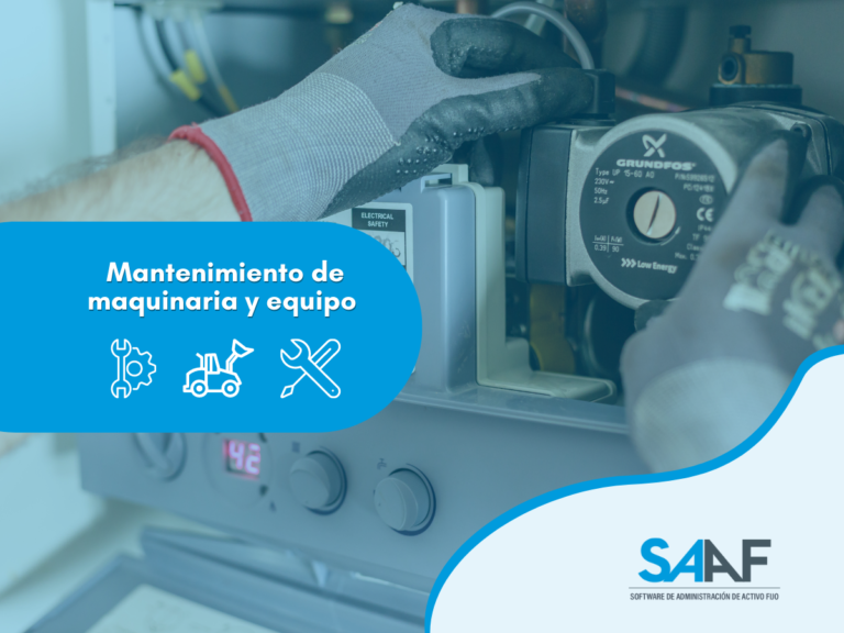 Las manos de un hombre dando mantenimiento a maquinaria industrial.